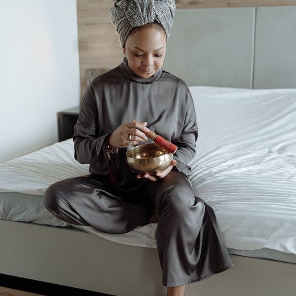 Person meditating peacefully after a gentle cardio session, showing a sense of calm.